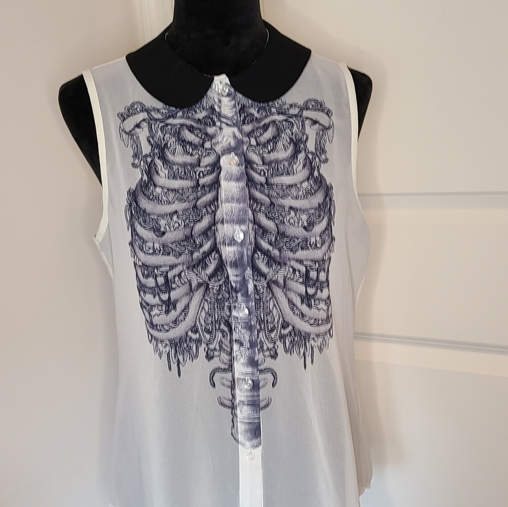 Iron Fist Ivory Rib Cage Top
